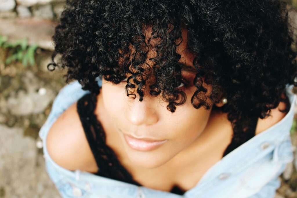 why do black women wear wigs